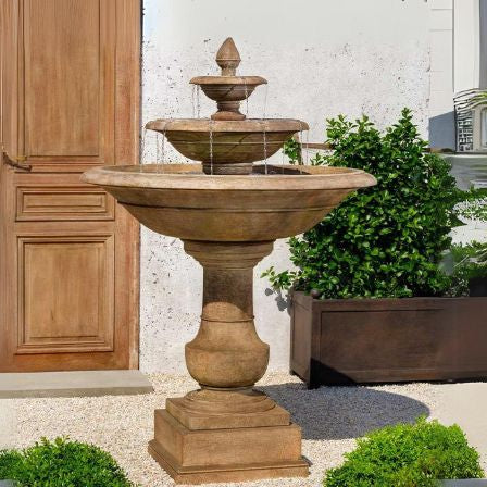 Savannah fountain on pebble against door featured image