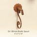 Gi-128 Iron Rustic Spout against brown background.