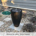 Manzanita Fountain in action surrounded mix pebbles.