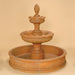 Patio Artistes Two Tier Pond Fountain against brown background.